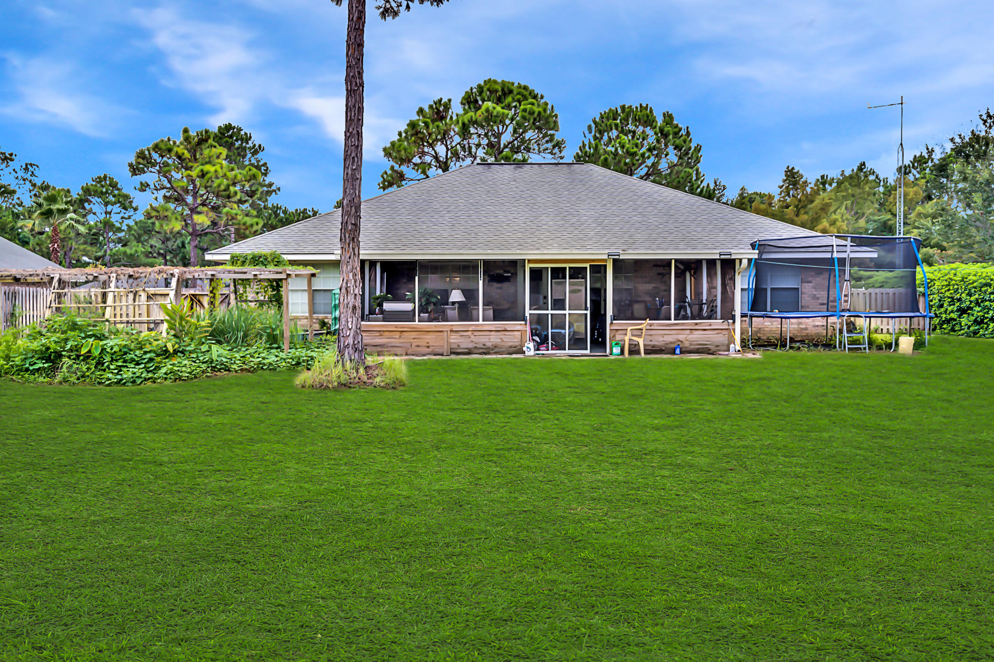 23 East Shipwreck Road Santa Rosa Beach, FL 32459 - Photo 18 of 21 a front view of house with yard and green space