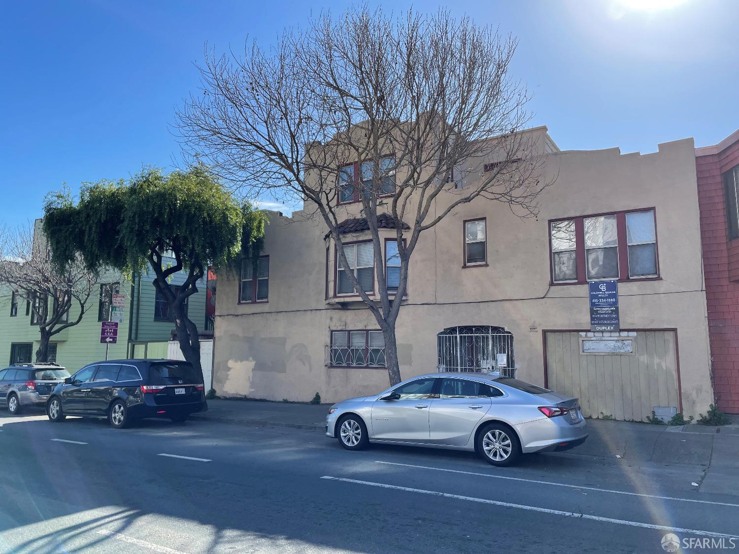 a car parked in front of a house