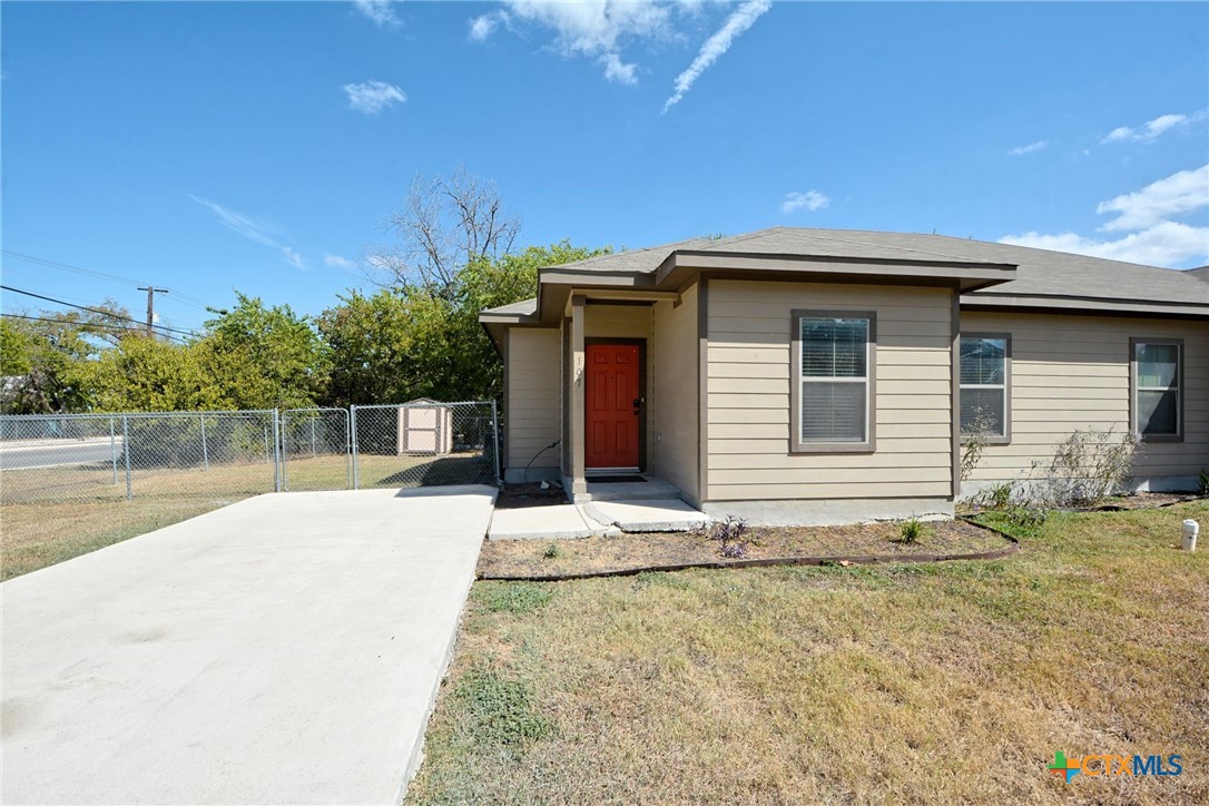 107 Rosedale Avenue New Braunfels, TX 78130 - Photo 2 of 21 a house with trees in the background