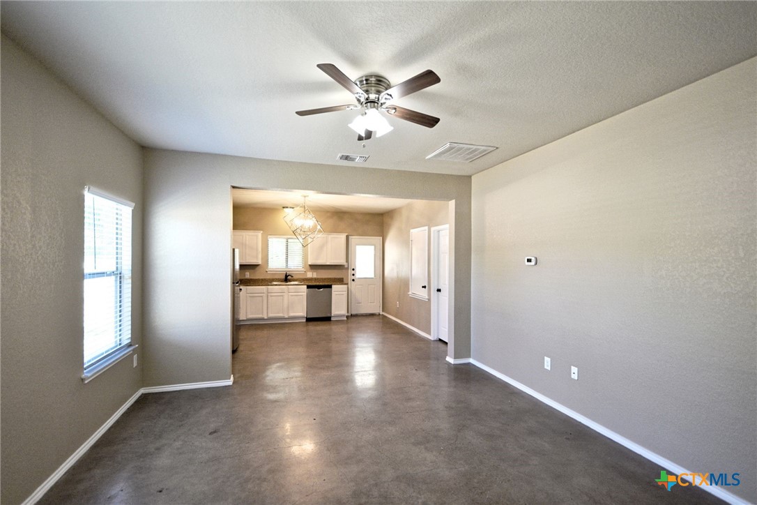 107 Rosedale Avenue New Braunfels, TX 78130 - Photo 3 of 21 a view of empty room with window and ceiling fan