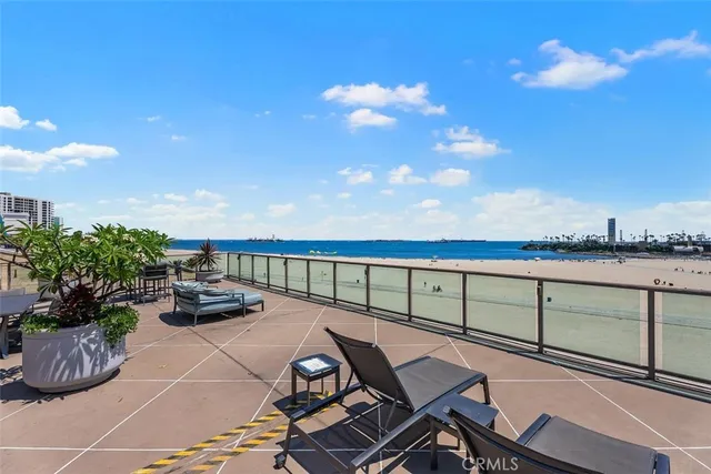 a view of a terrace with furniture