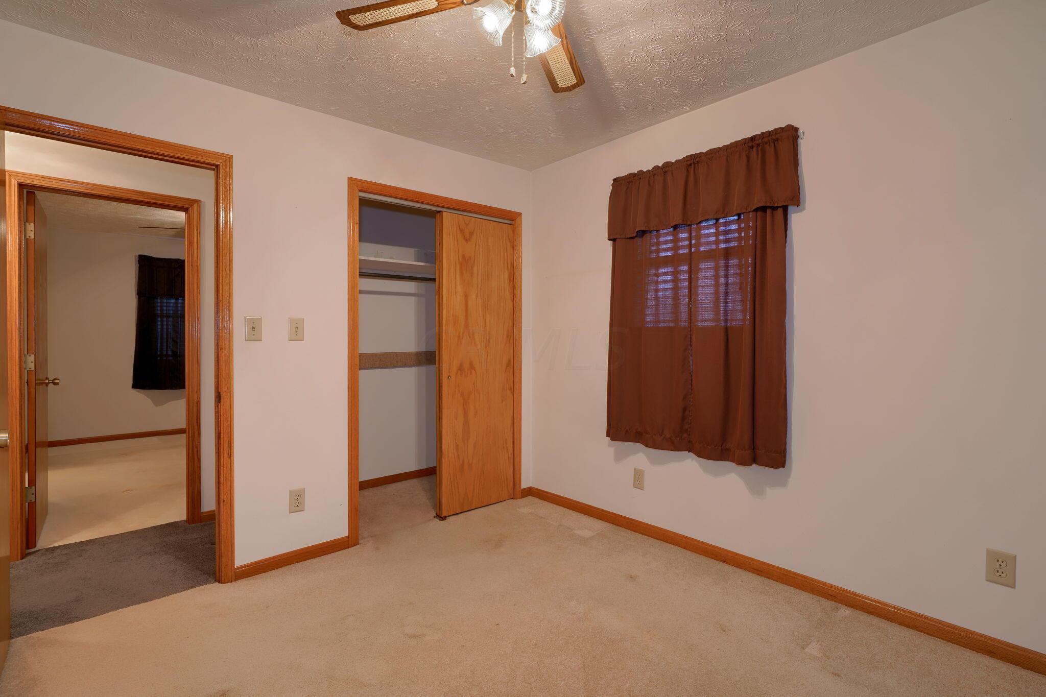 191 Rockwell Road Columbus, OH 43207 - Photo 19 of 28 Bedroom with updated flooring and ceiling fan