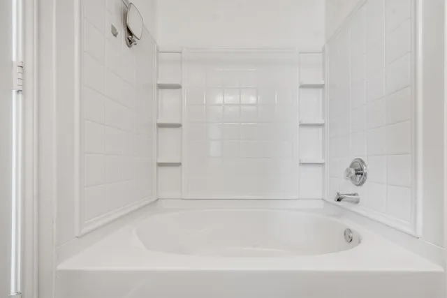 a bathroom with a bathtub