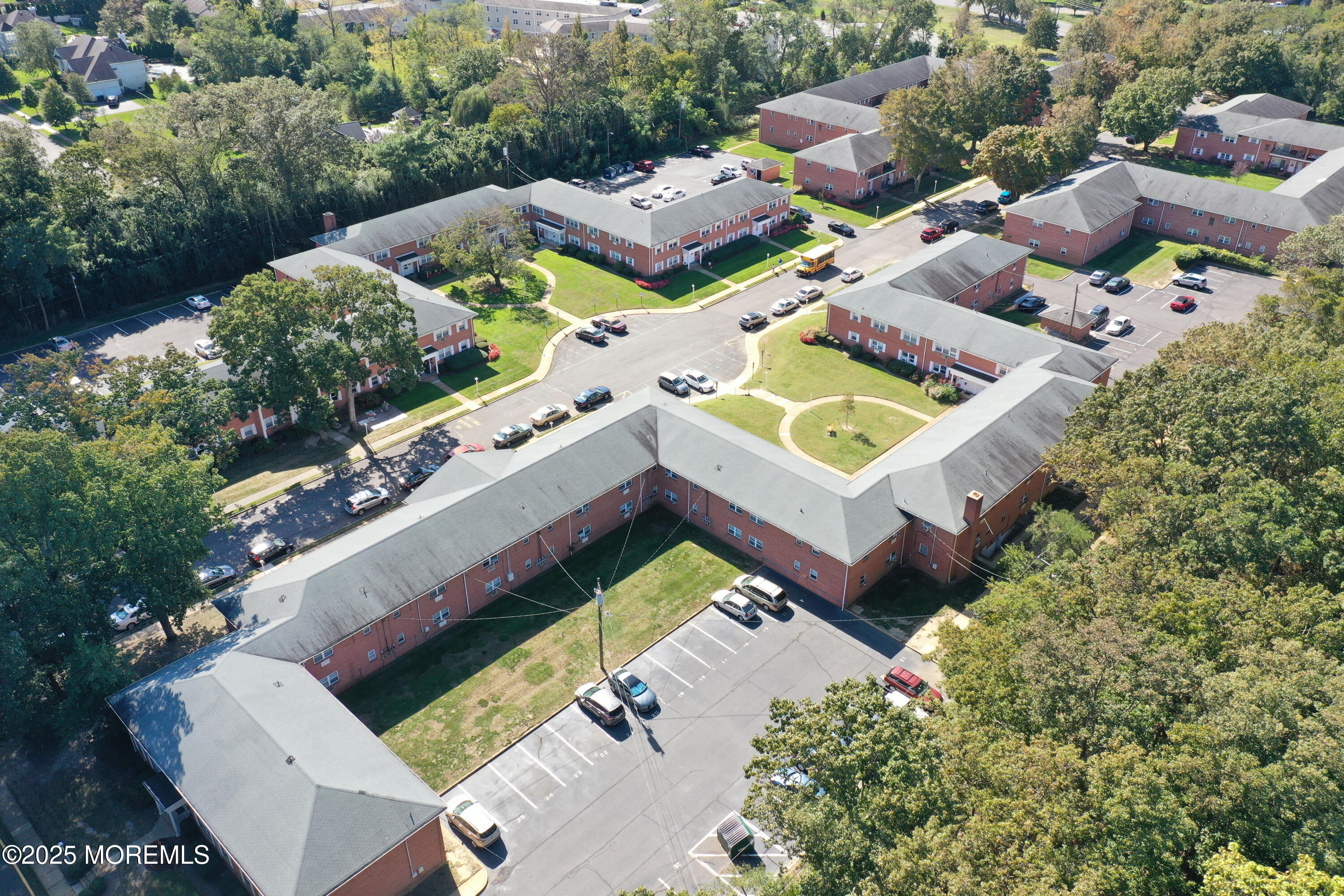 151 Spring Lake Garden Court, Unit 119 Spring Lake, NJ 07762 - Photo 8 of 8 an aerial view of a house with a garden