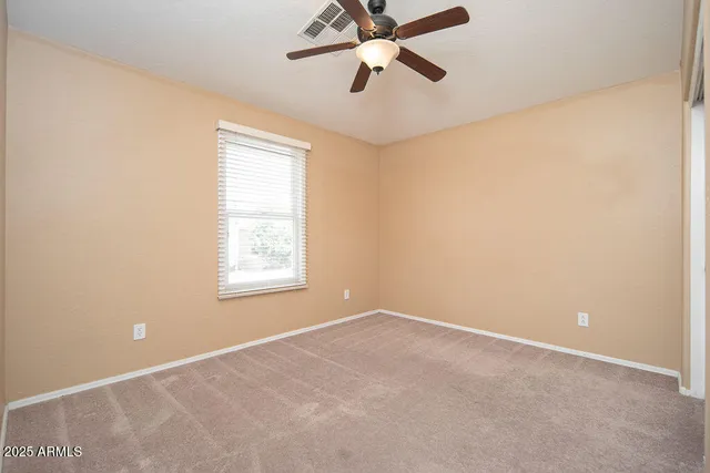 a view of a window in an empty room