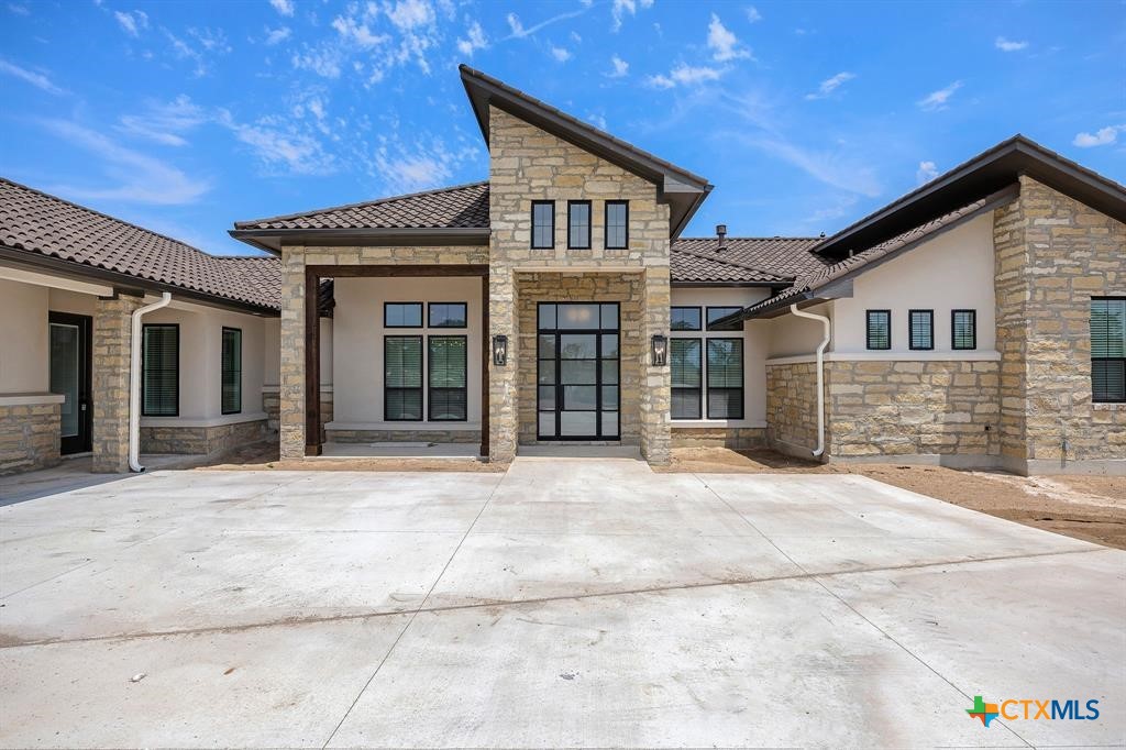 a house with yard in front of it