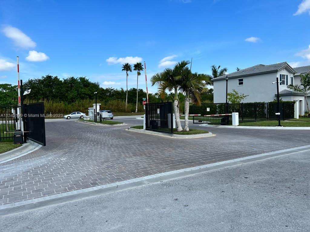 2633 Southeast 10th Street, Unit 2633 Homestead, FL 33035 - Photo 26 of 42 a view of street with parked cars