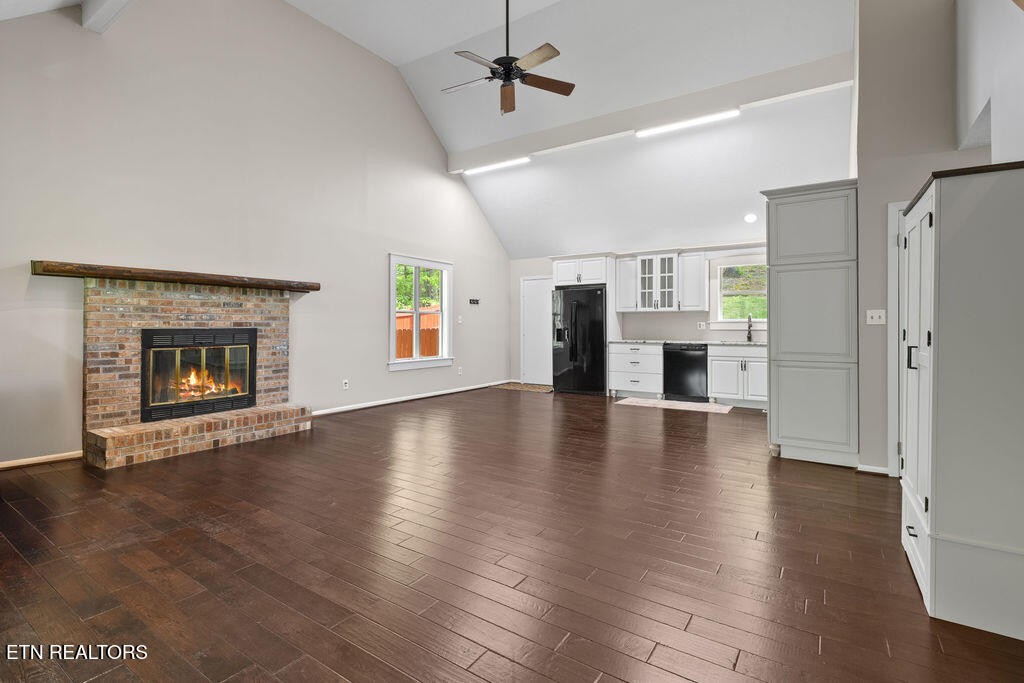 8908 Ellis Lane Powell, TN 37849 - Photo 4 of 37 a view of an empty room with a fireplace and a window