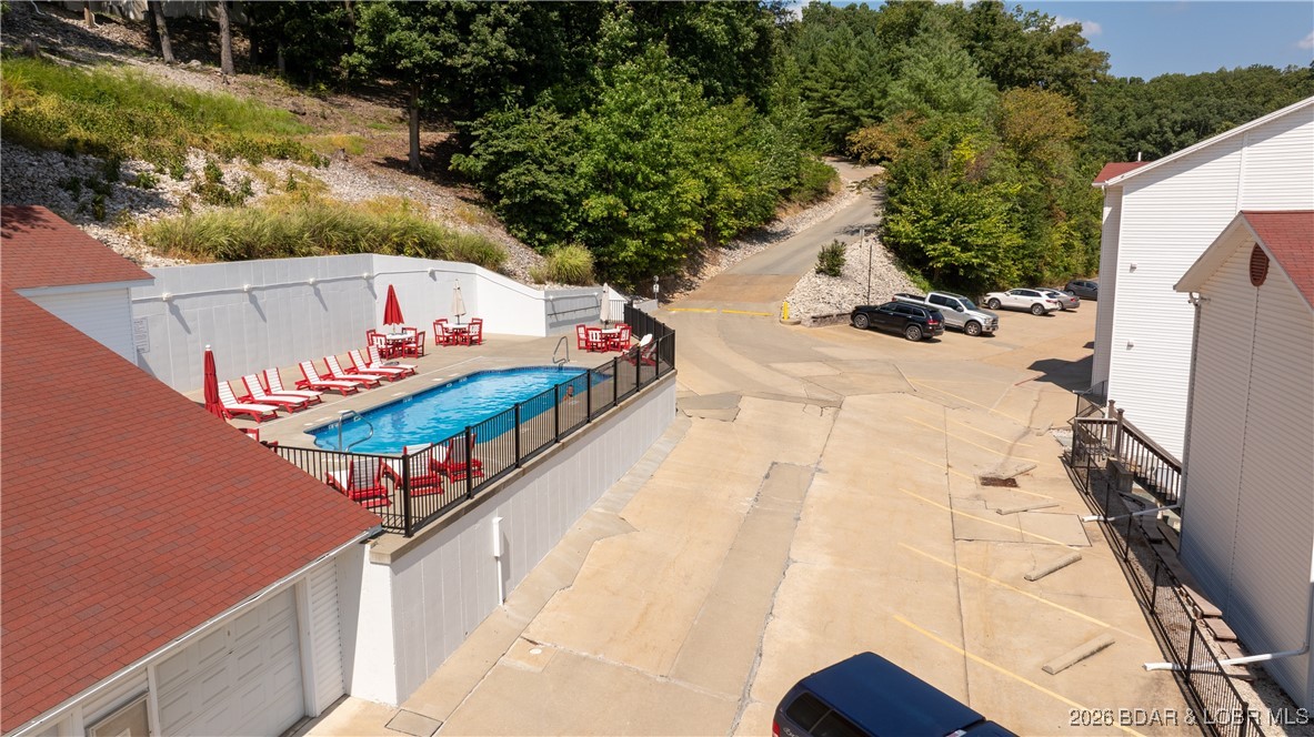 40 Lighthouse Road, Unit 5201 Lake Ozark, MO 65049 - Photo 28 of 32 The pool is a favorite gathering place and right a