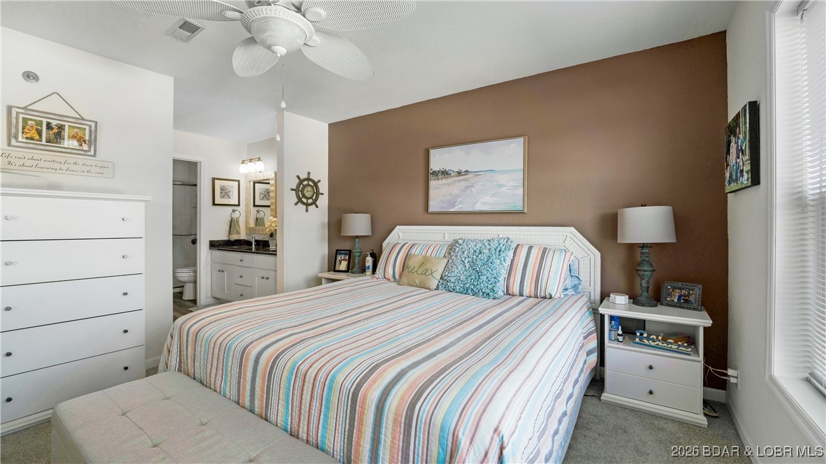 40 Lighthouse Road, Unit 5201 Lake Ozark, MO 65049 - Photo 7 of 32 Lakeside Master Bedroom with plenty of space for t