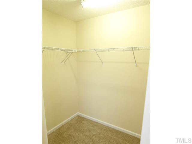 3131 Manhasset Lane Raleigh, NC 27604 - Photo 13 of 21 Huge master walk in closet with shelving.