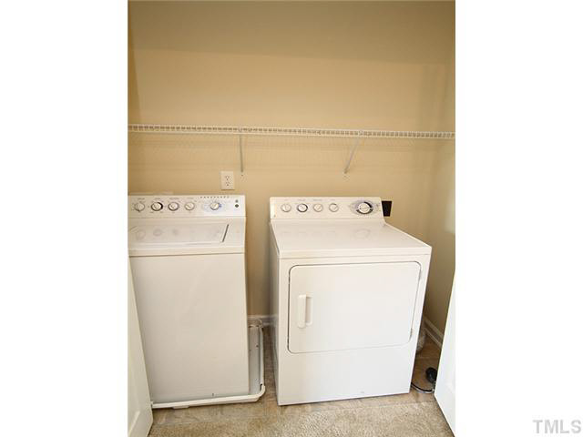 3131 Manhasset Lane Raleigh, NC 27604 - Photo 18 of 21 The washer and dryer also convey. Laundry closet is located in the second floor hallway close to the bedrooms.
