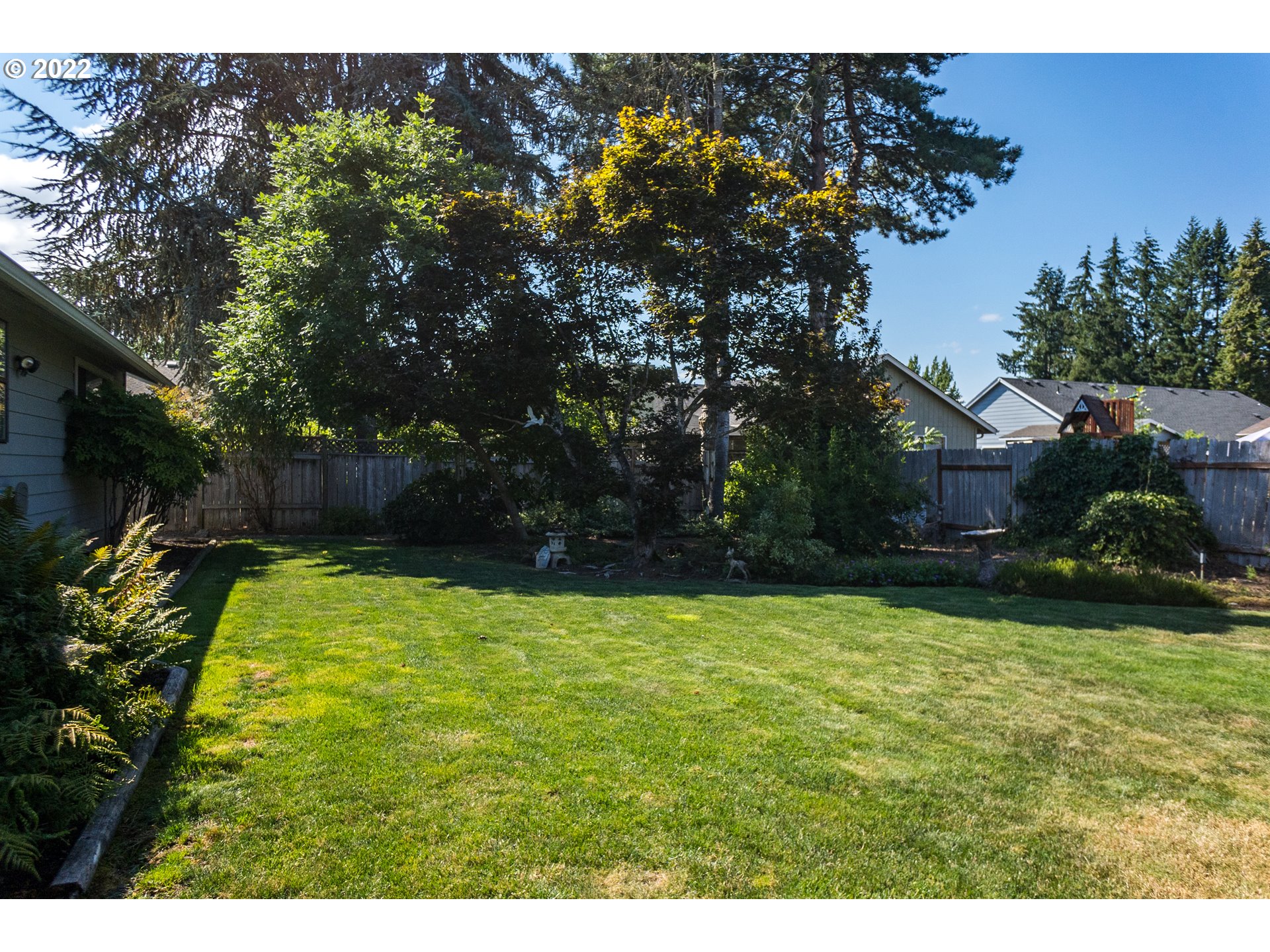 375 72nd Place Springfield, OR 97478 - Photo 29 of 32 a view of swimming pool with a garden