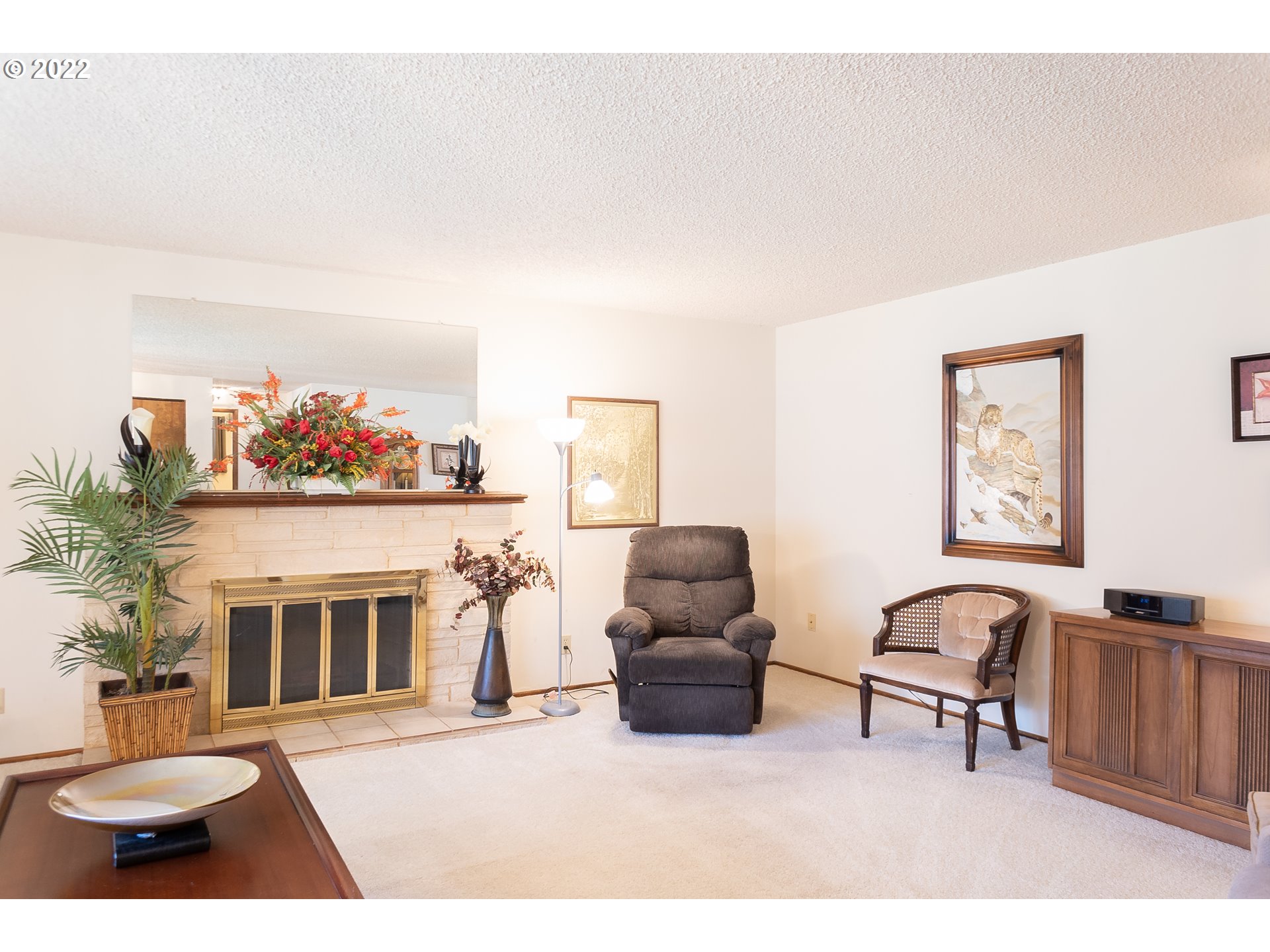375 72nd Place Springfield, OR 97478 - Photo 8 of 32 a living room with furniture and a fireplace