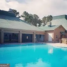 a view of a backyard of the house