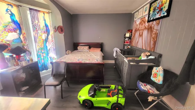 a bedroom with a bed and furniture