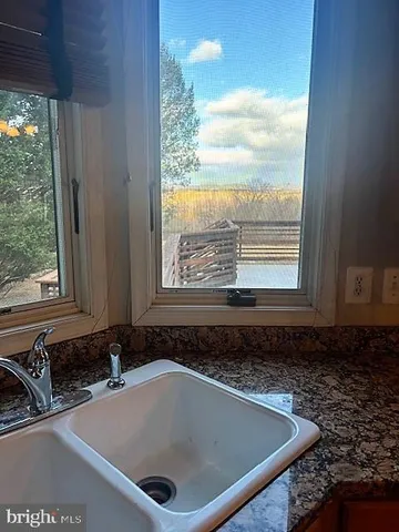 a view of a bathtub in a bathroom