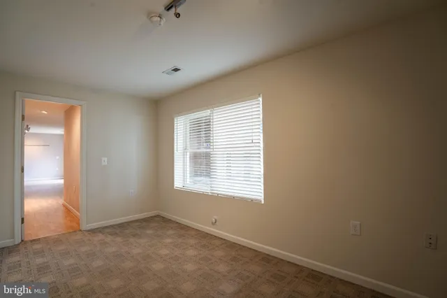 a view of a lake with a yard