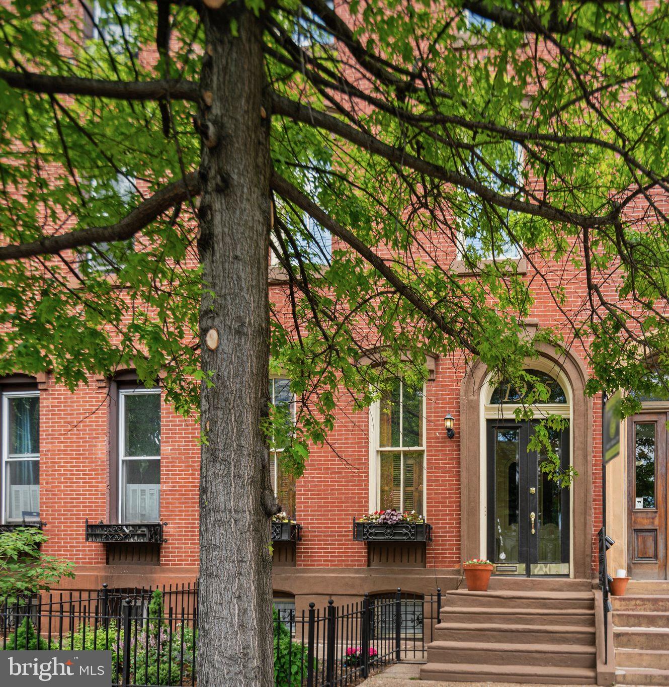1935 Spring Garden Street Philadelphia, PA 19130 - Photo 2 of 49 front view of a house with a tree