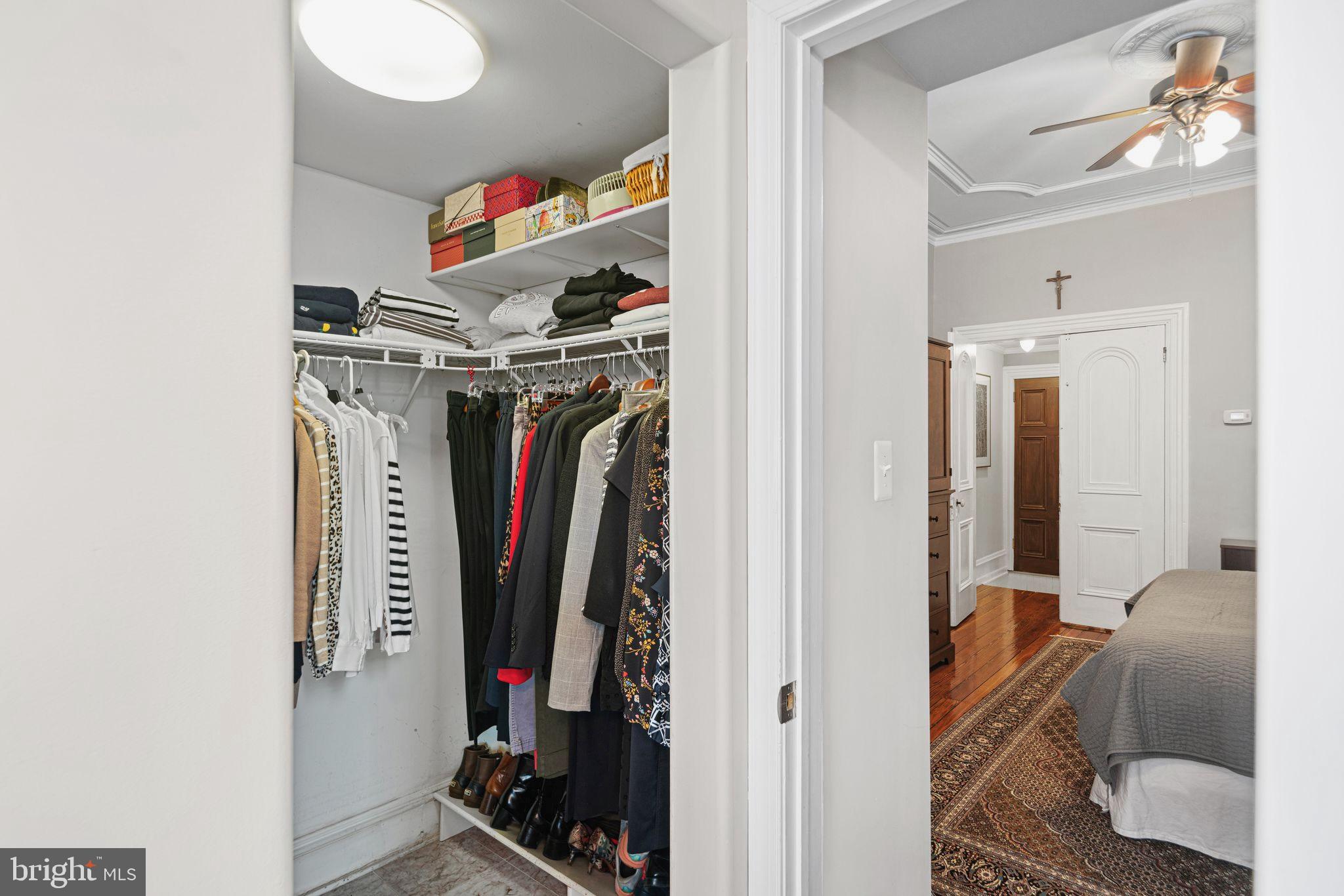 1935 Spring Garden Street Philadelphia, PA 19130 - Photo 22 of 49 a view of walk in closet with clothes and shoes