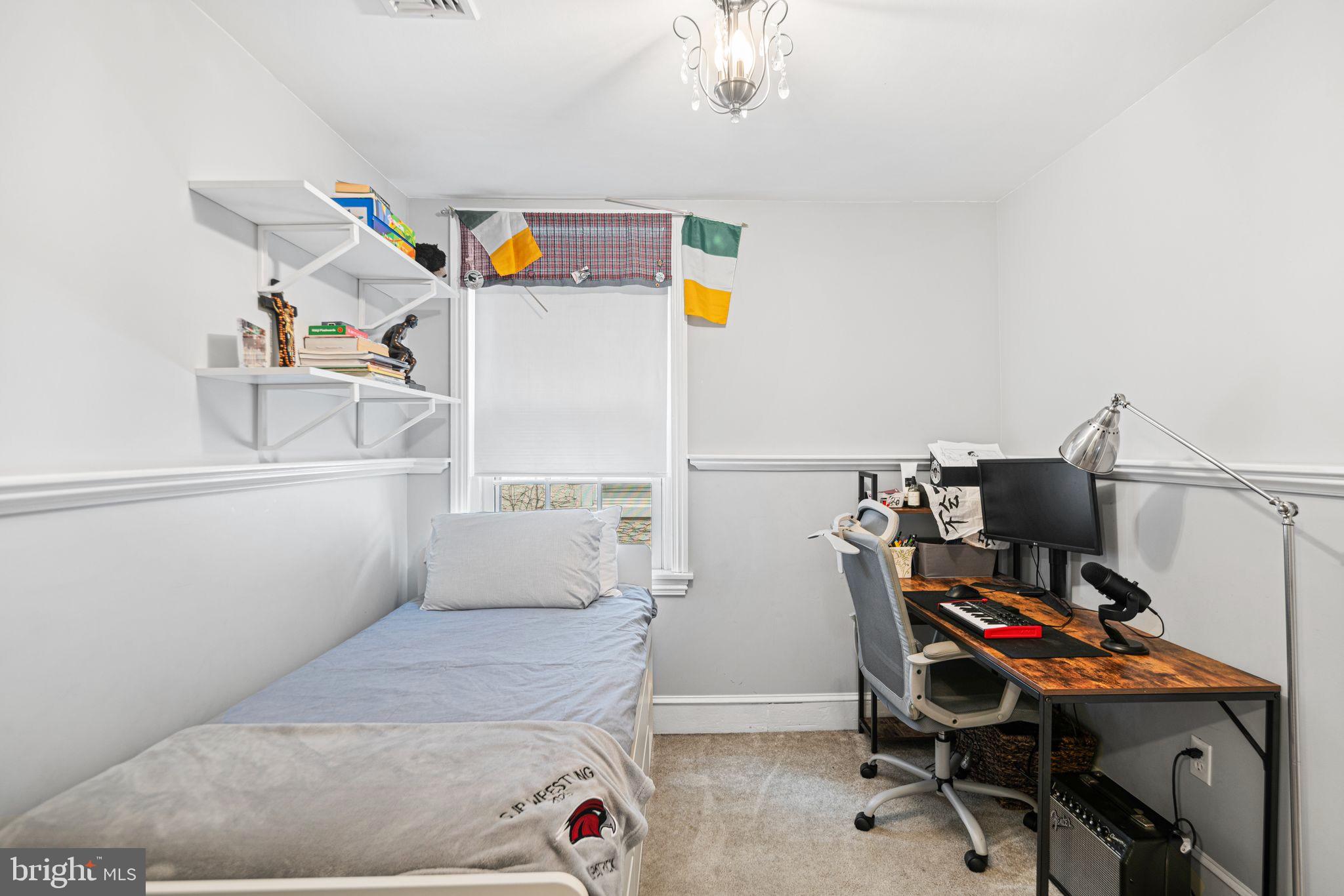 1935 Spring Garden Street Philadelphia, PA 19130 - Photo 24 of 49 a bedroom with a workspace