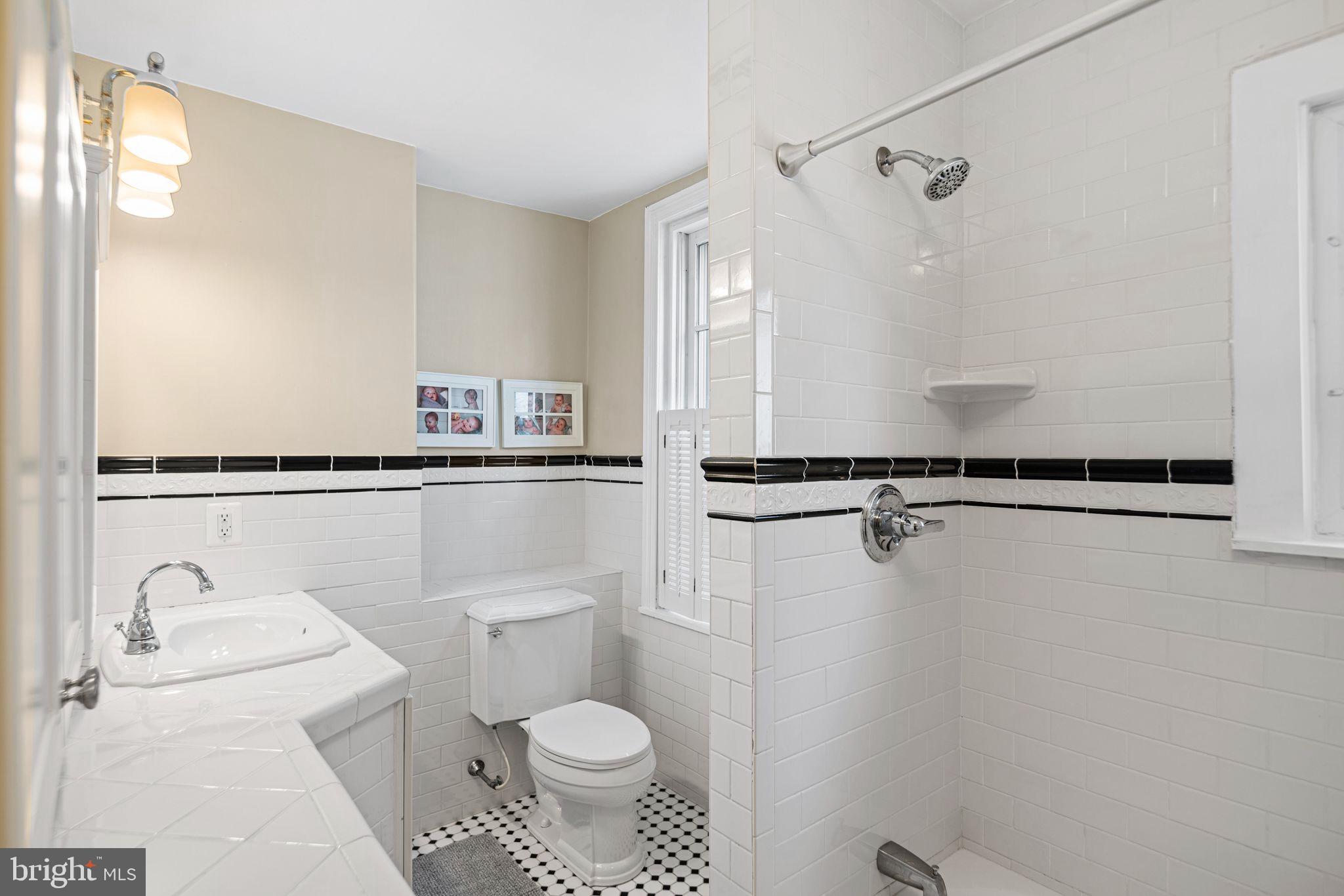 1935 Spring Garden Street Philadelphia, PA 19130 - Photo 25 of 49 a bathroom with a toilet sink and shower