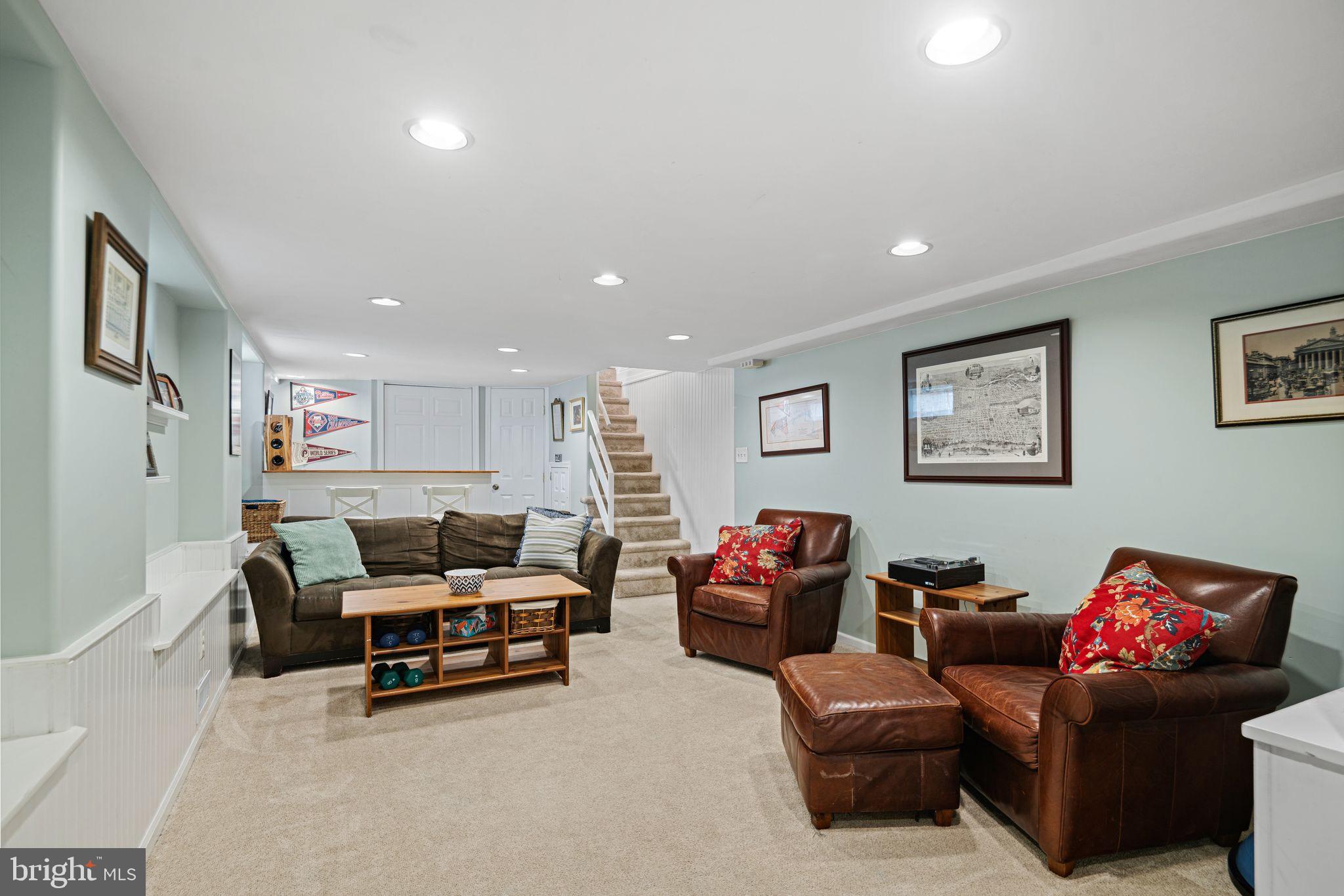 1935 Spring Garden Street Philadelphia, PA 19130 - Photo 28 of 49 a living room with furniture and a flat screen tv