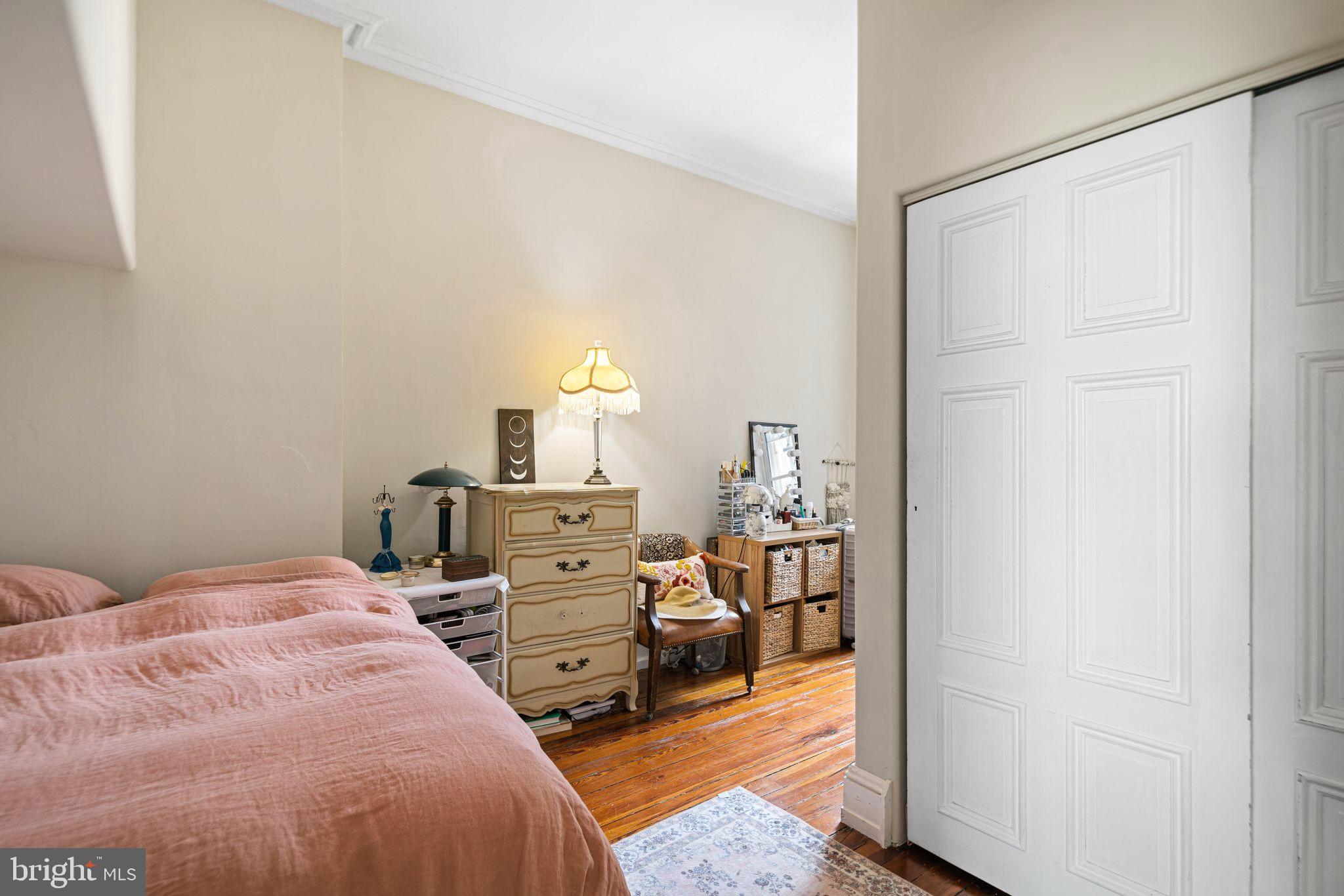 1935 Spring Garden Street Philadelphia, PA 19130 - Photo 36 of 49 a bedroom with a bed and a closet