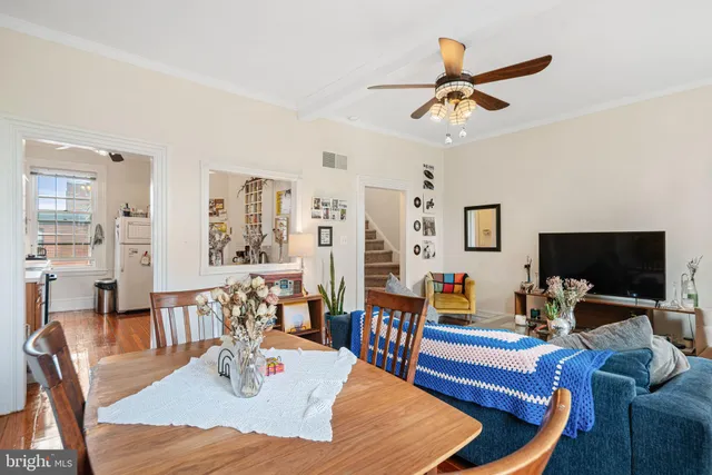 a kitchen with stainless steel appliances granite countertop a stove and a wooden cabinets