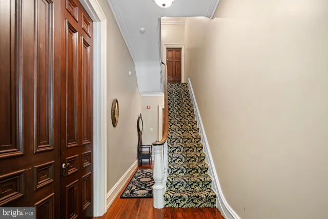 a view of stairs with wooden floor