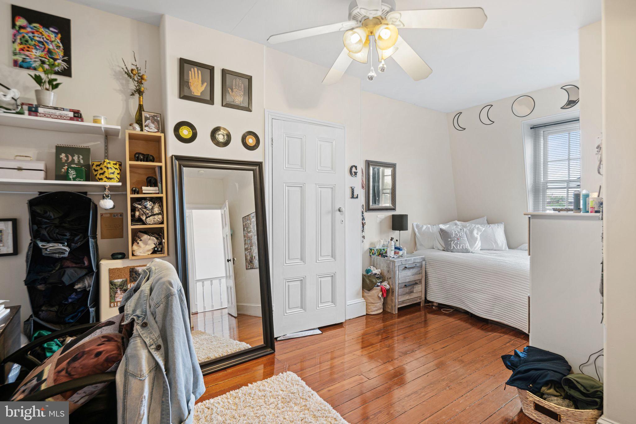 1935 Spring Garden Street Philadelphia, PA 19130 - Photo 44 of 49 a living room with furniture and a flat screen tv