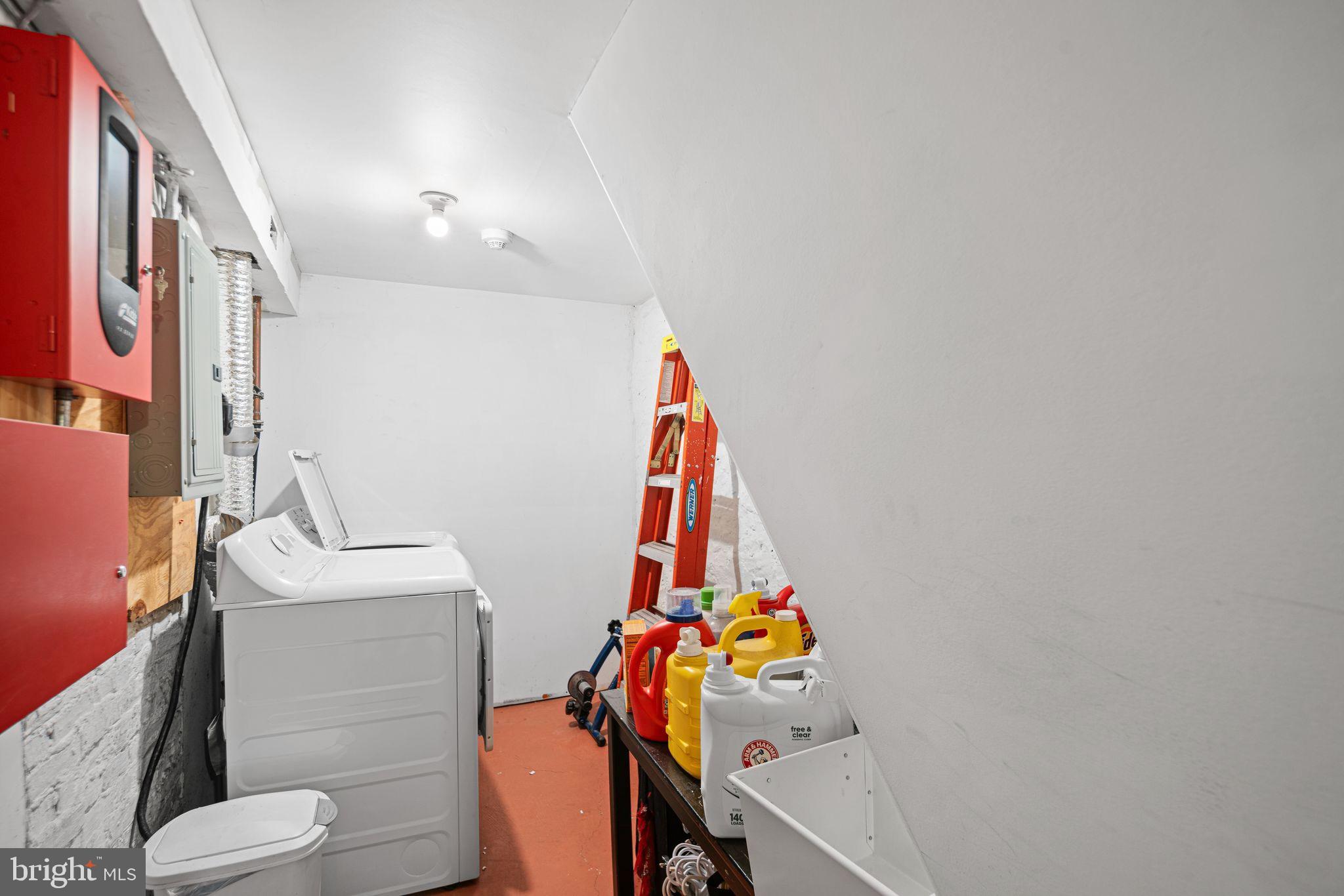 1935 Spring Garden Street Philadelphia, PA 19130 - Photo 47 of 49 a bathroom with a sink vanity mirror and toilet
