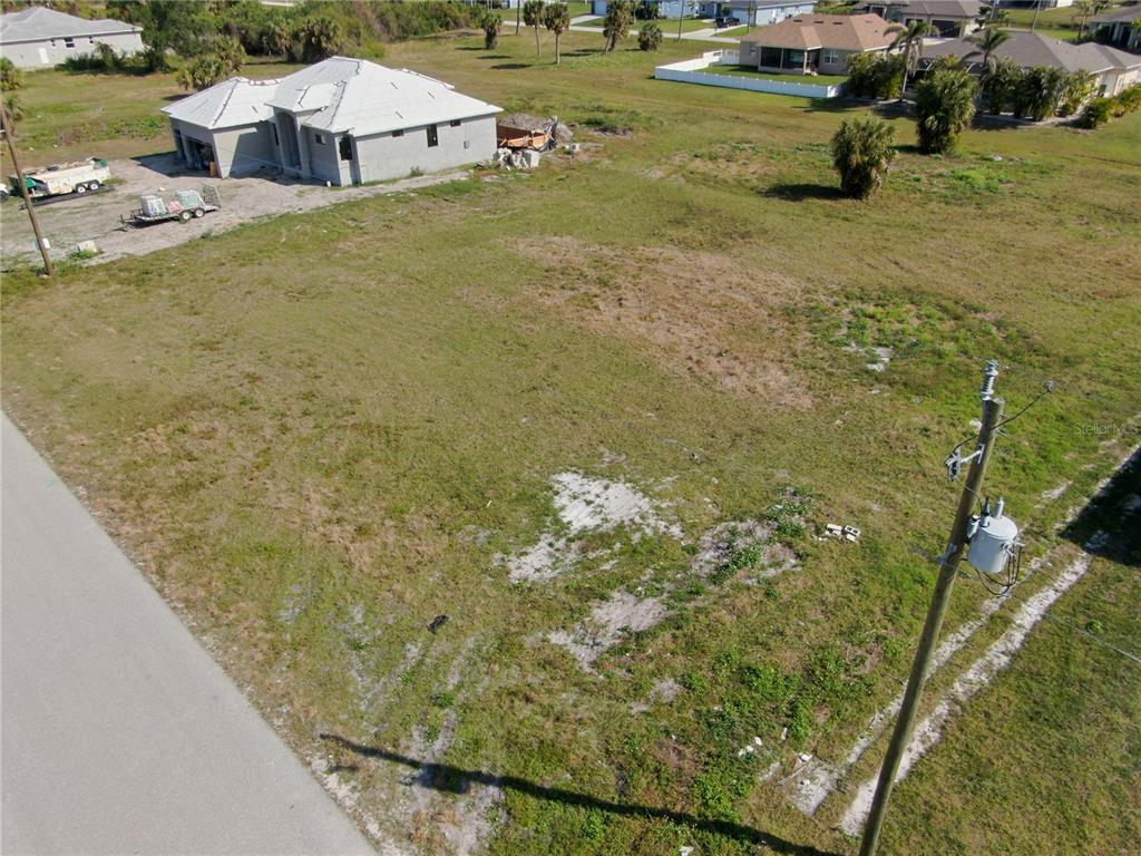 191 Rotonda Boulevard South Rotonda West, FL 33947 - Photo 4 of 8 a view of residential houses with outdoor space