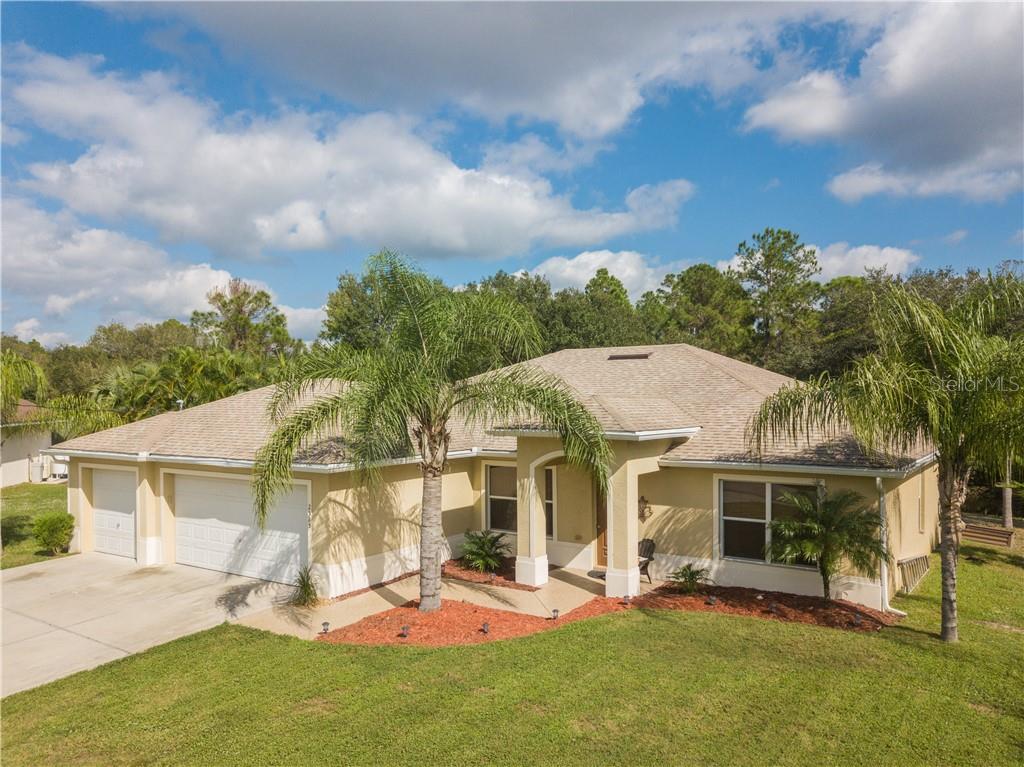 EXCEPTIONAL 4 BEDROOM, 2 BATH CANALFRONT POOL HOME IN UP AND COMING NORTH PORT!