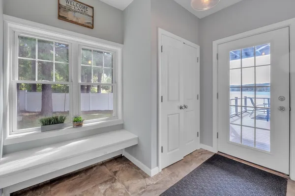 a view of living room with furniture and window
