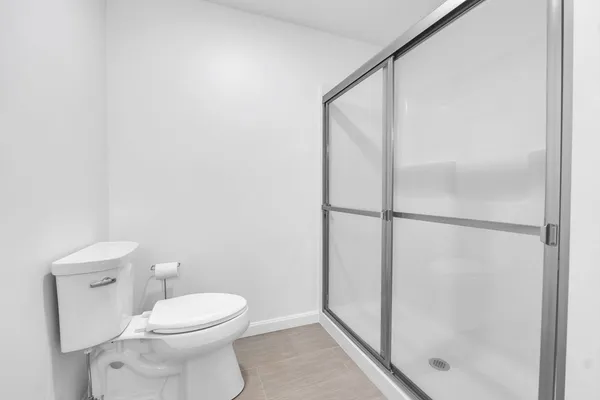 a bathroom with a granite countertop sink and vanity