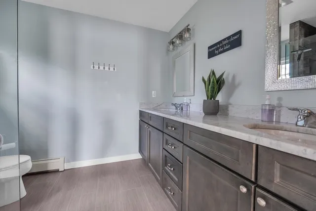 a bedroom with bed and window