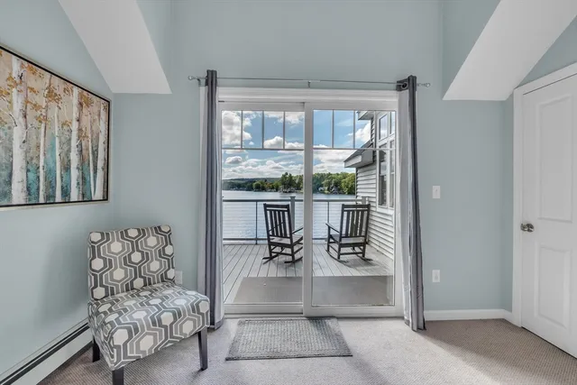 a view of a chairs on the roof deck