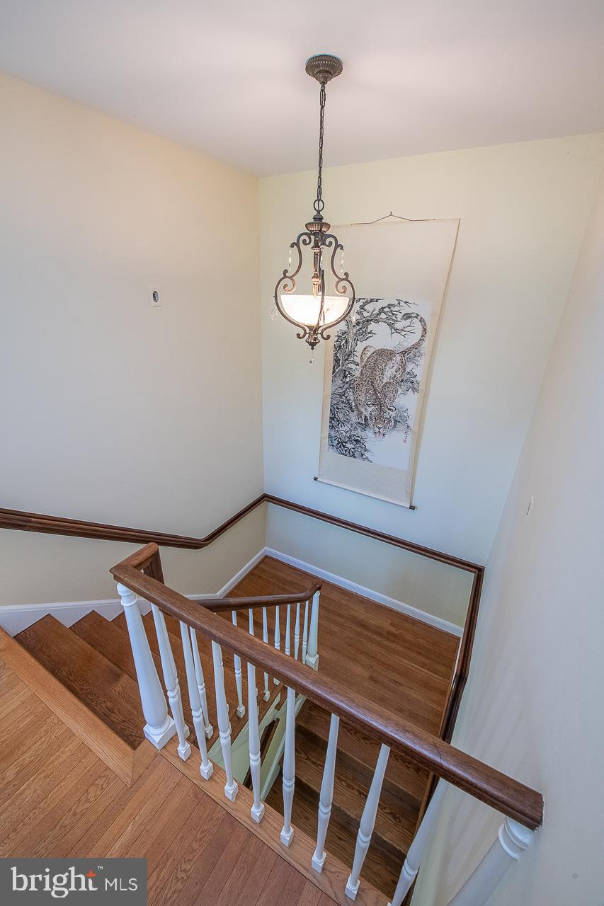 237 Atlee Road Wayne, PA 19087 - Photo 32 of 44 Turned Hardwood staircase to 2nd floor