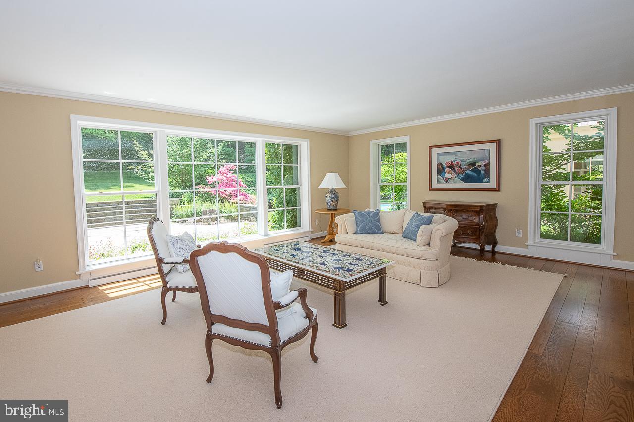 237 Atlee Road Wayne, PA 19087 - Photo 8 of 44 Living room with view of rear patio and gardens