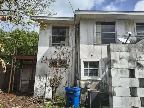 a front view of a house with glass windows