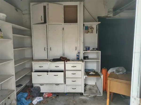 a view of cabinets and window