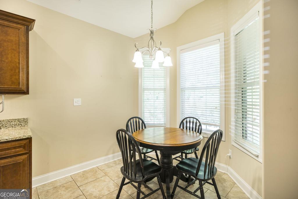 206 Londe Lane Perry, GA 31069 - Photo 14 of 37 a view of a dining room with furniture and window