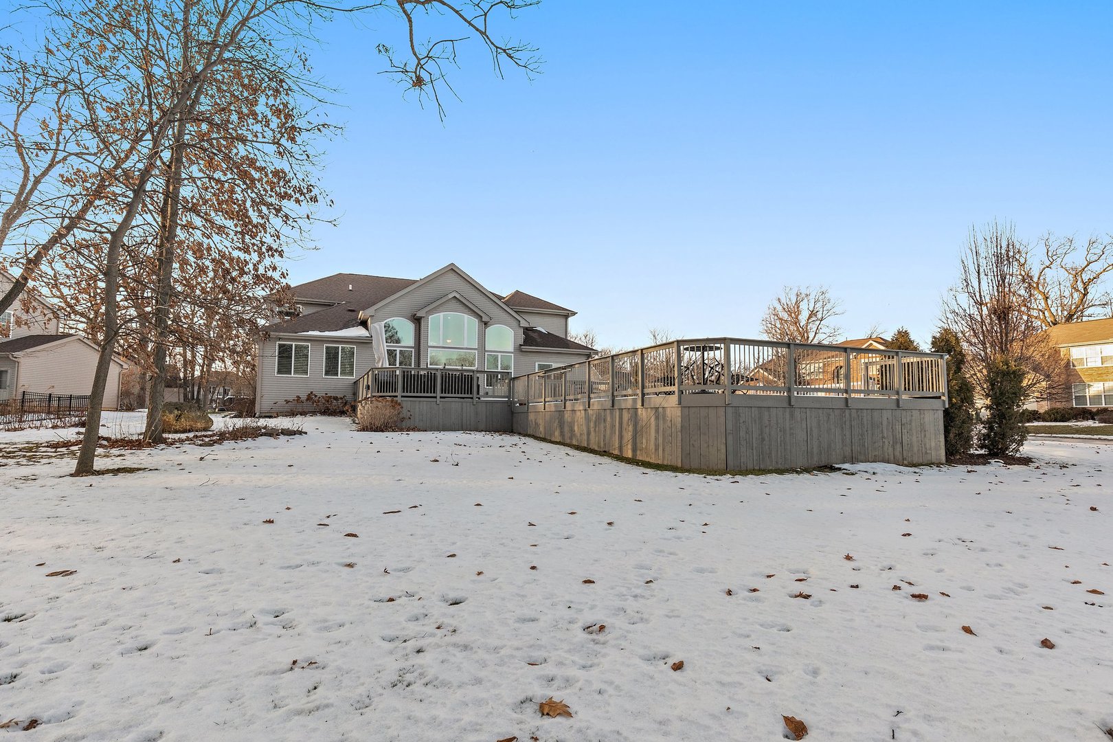 5617 Red Oak Drive Hoffman Estates, IL 60192 - Photo 28 of 30 a view of houses with snow on the road