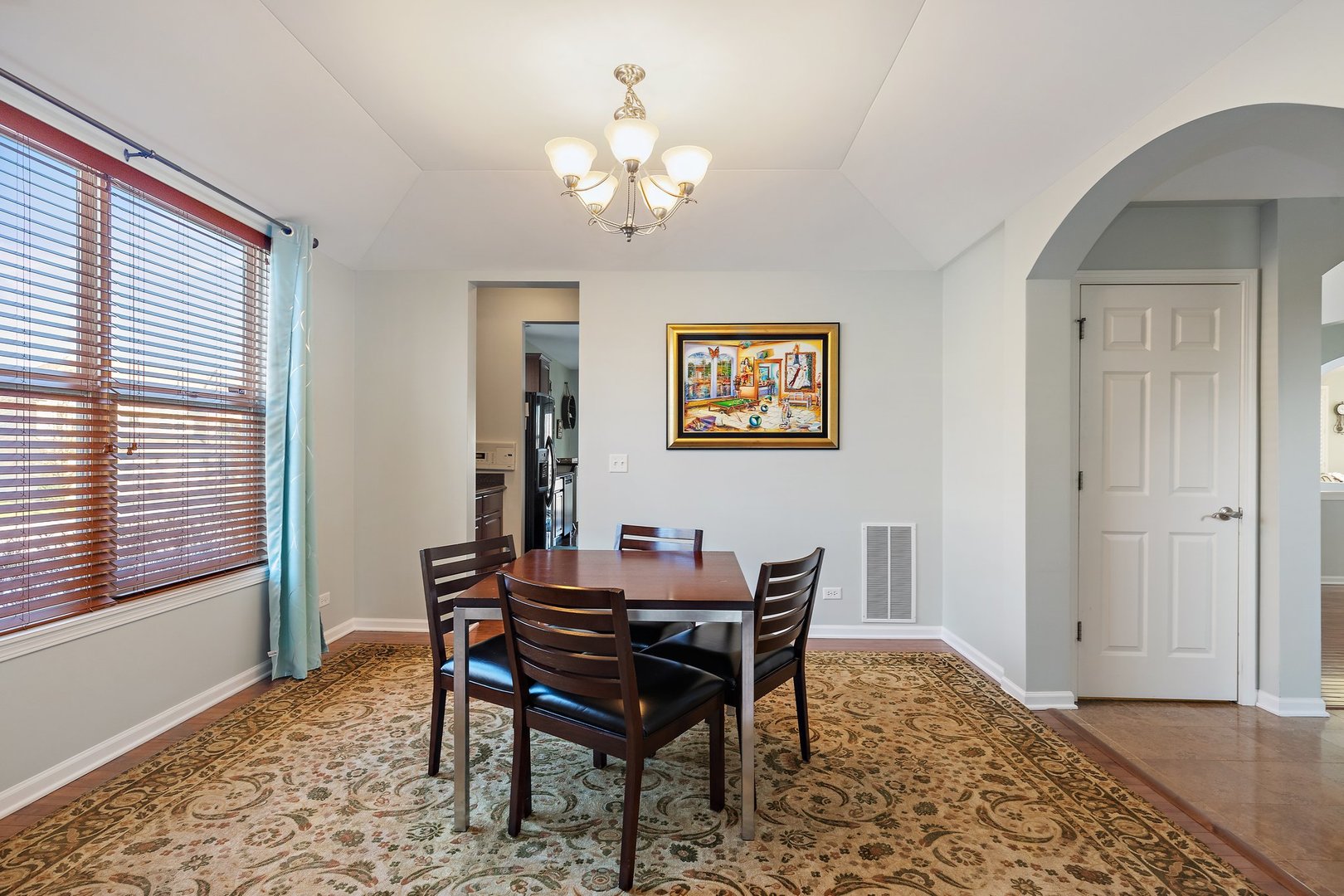 5617 Red Oak Drive Hoffman Estates, IL 60192 - Photo 4 of 30 a view of a dining room with furniture and a window