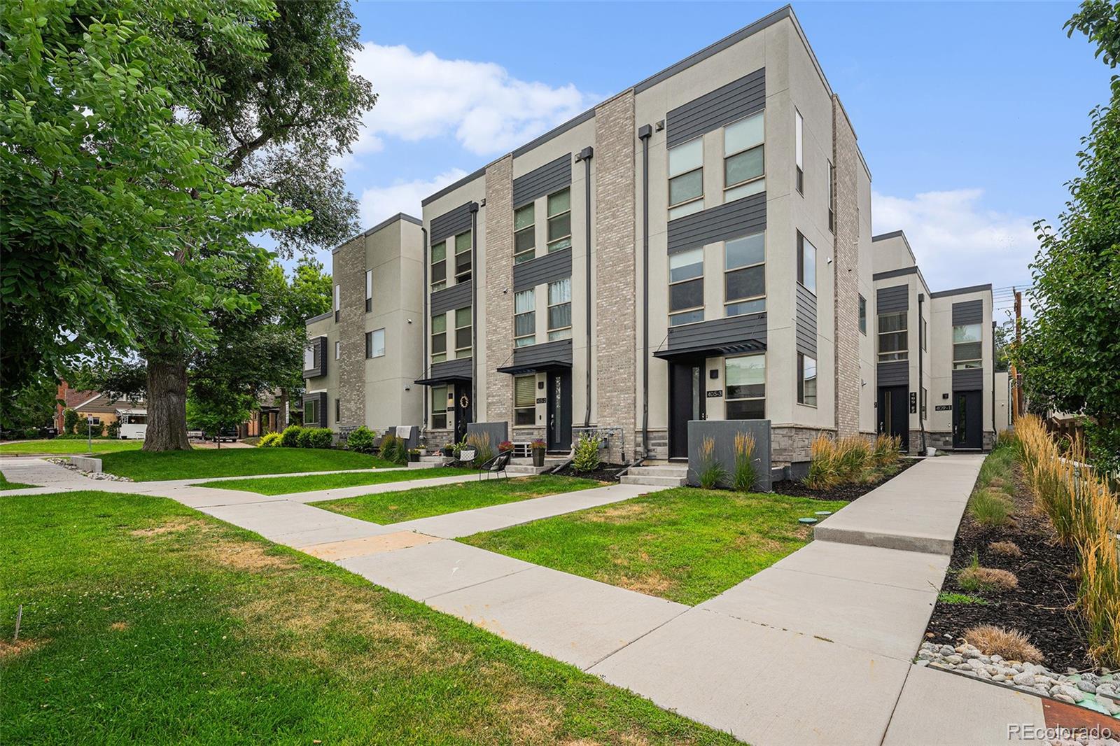 a view of a building with a yard