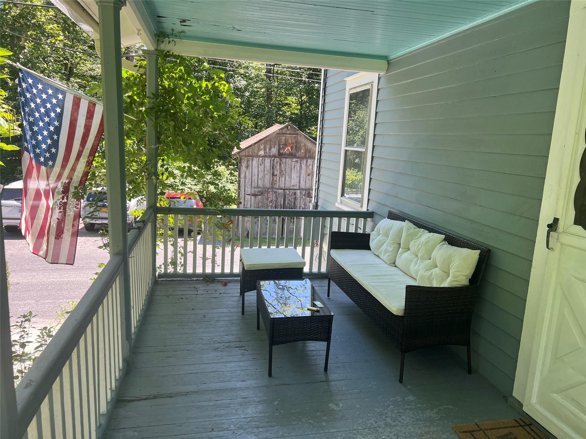 20 Continental Road Cornwall, NY 12518 - Photo 2 of 19 a balcony with furniture and a potted plant