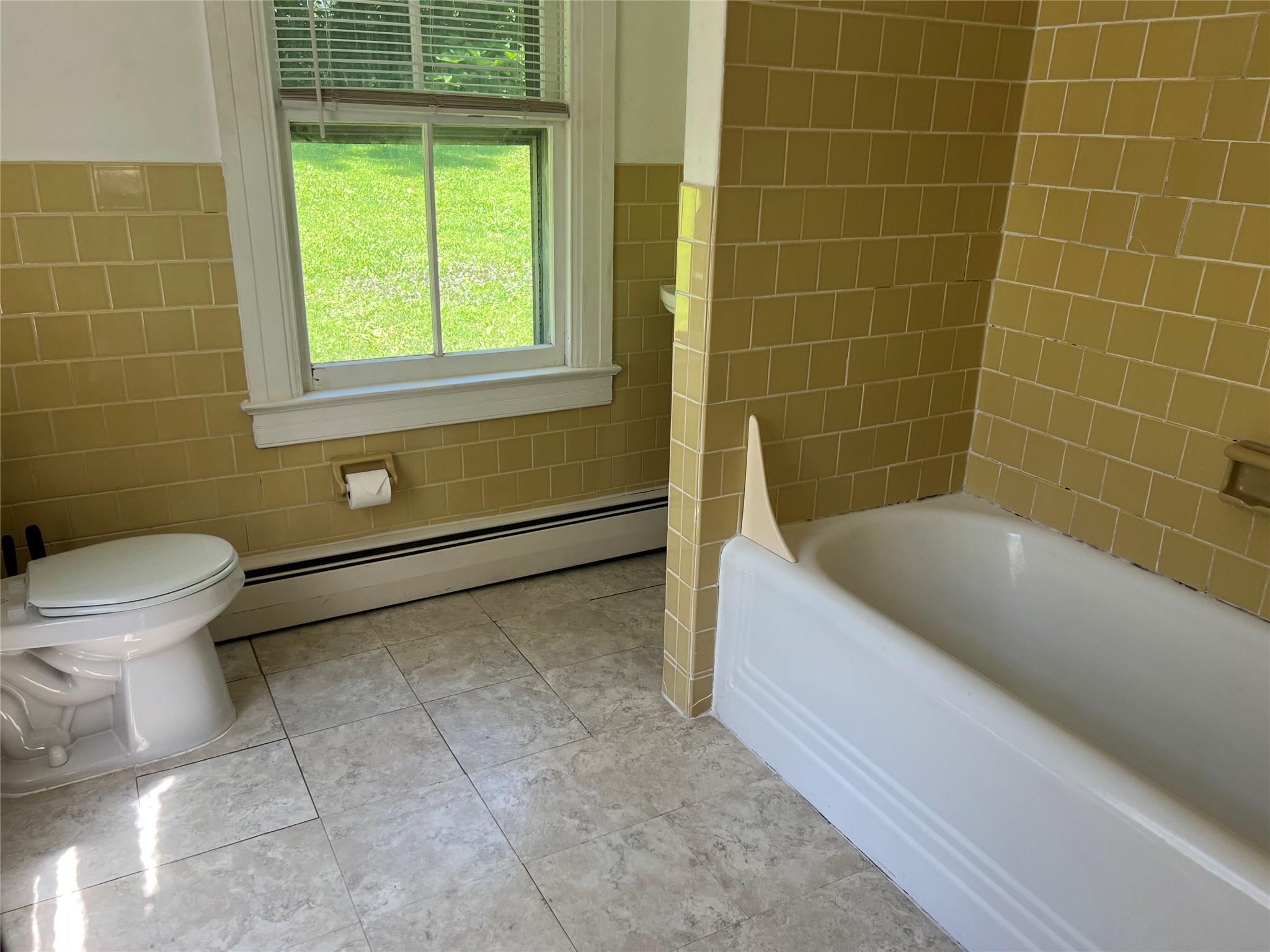 20 Continental Road Cornwall, NY 12518 - Photo 10 of 19 a bathroom with a toilet and bathtub
