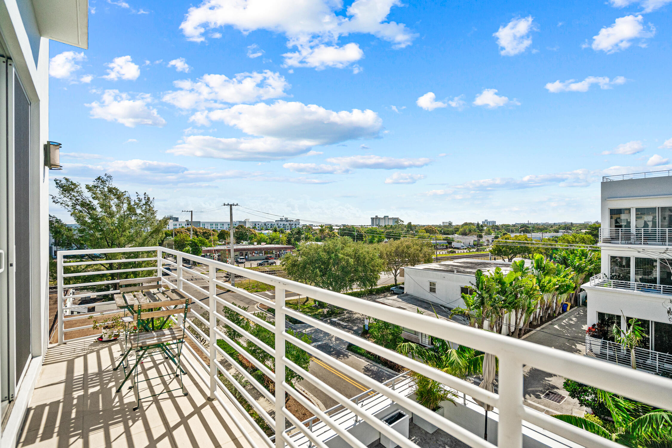 111 Southeast 2nd Street, Unit 401 Delray Beach, FL 33444 - Photo 14 of 38 a view of a balcony with city view