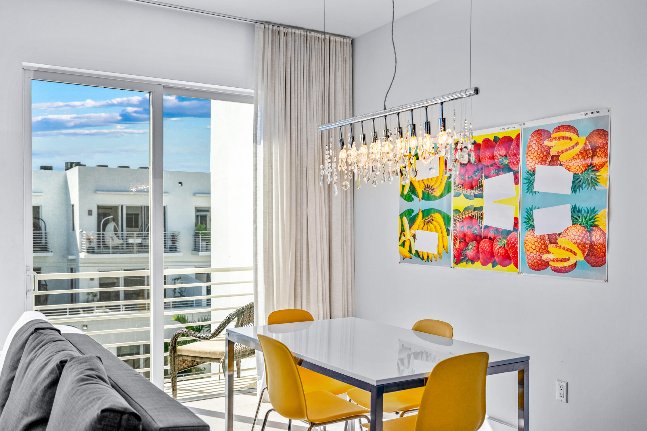 111 Southeast 2nd Street, Unit 401 Delray Beach, FL 33444 - Photo 22 of 38 a view of a dining area with furniture and toys